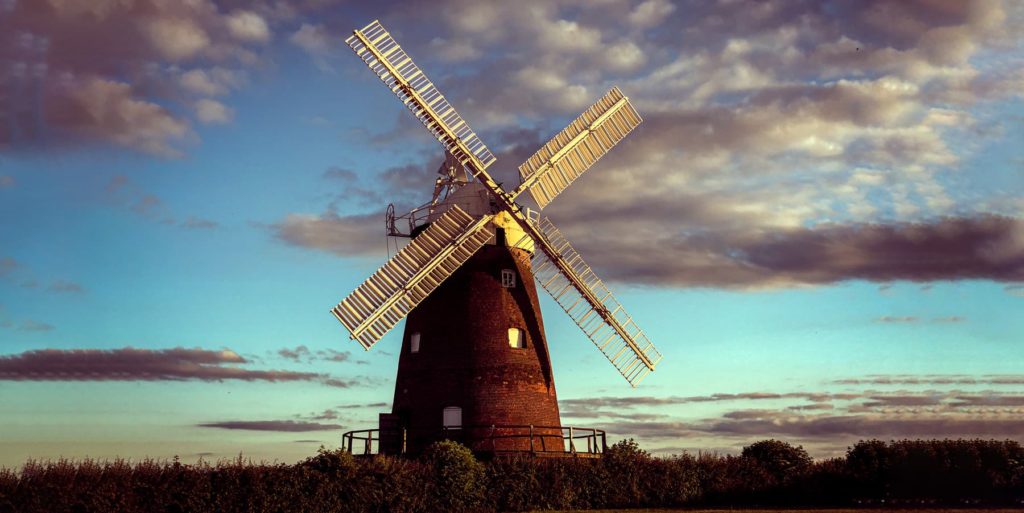 Windmill set against a blue and cloudy sky found in North Essex